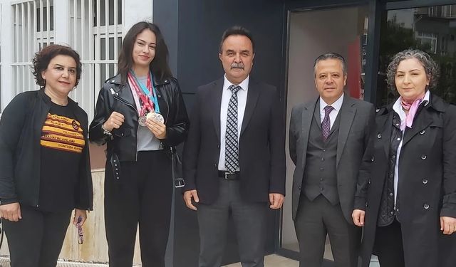 İKRA GÜRPINAR'DAN, GÜMÜŞ MADALYA